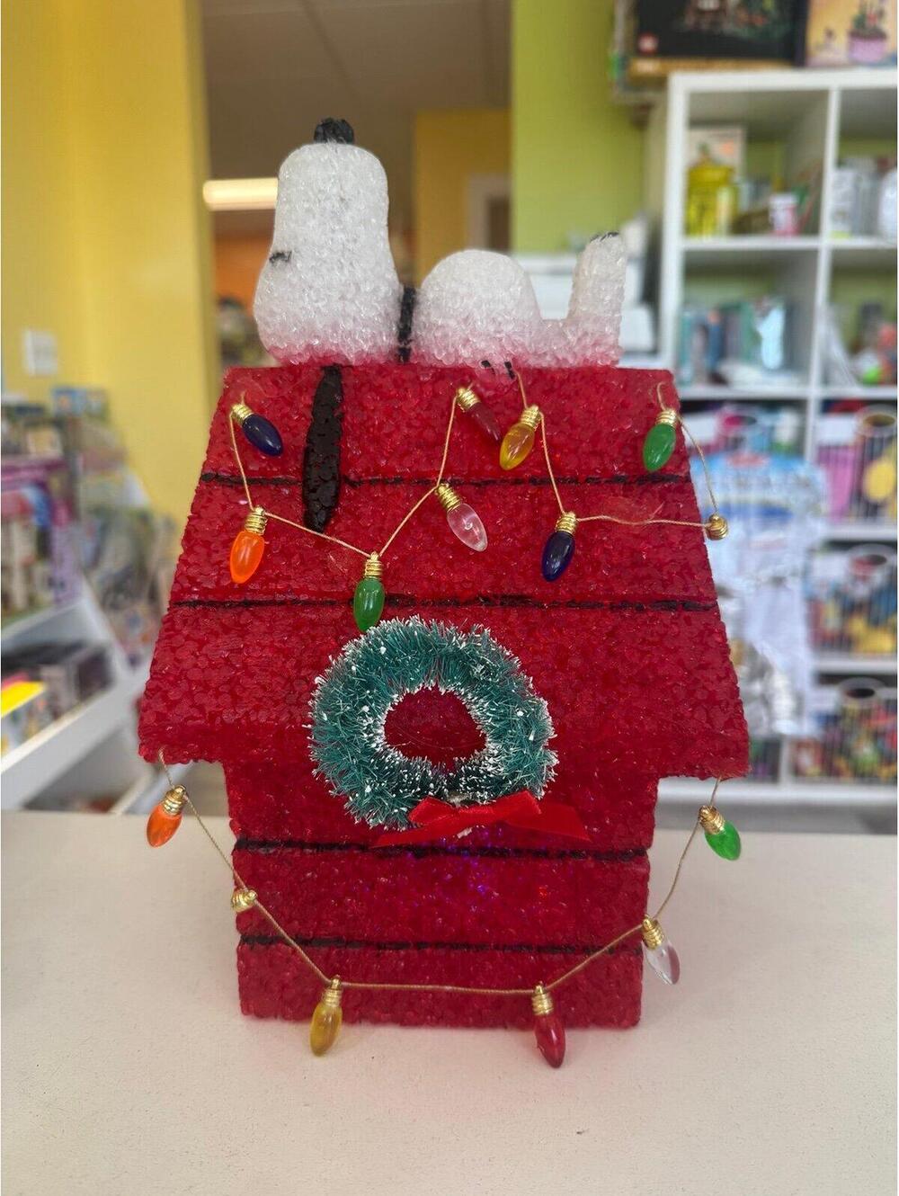 Hallmark PEANUTS Snoopy on a Decorated Red Doghouse Christmas Table